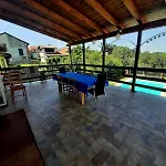 The House Among The Vineyards *